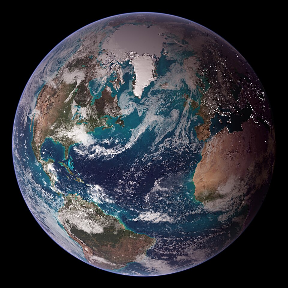 Earth seen from space, showing blue oceans, white clouds, and green and brown land